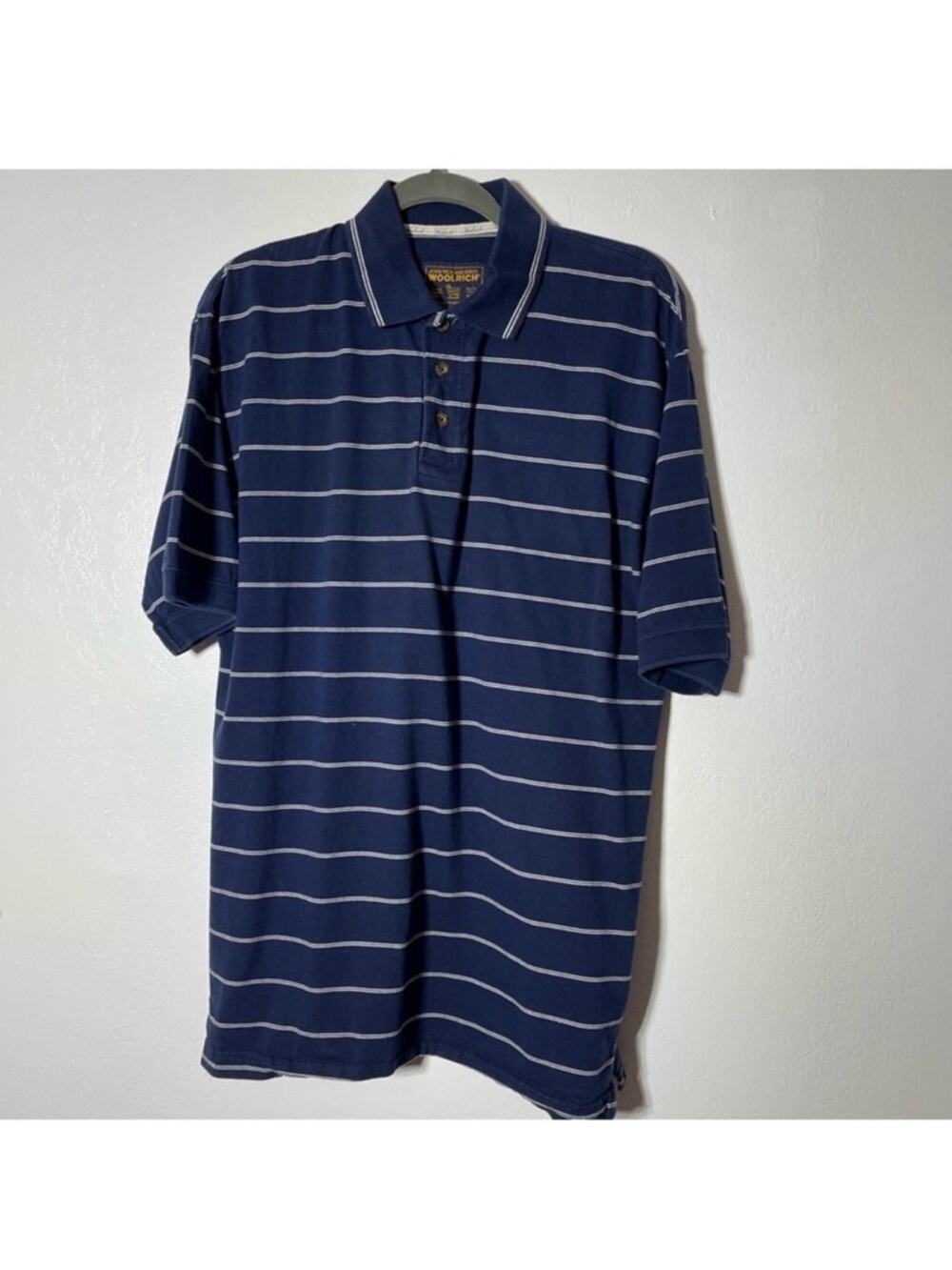 Woolrich, Striped Polo Shirt. Size Medium. In excellent condition!